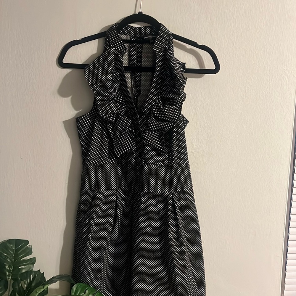 Black and white polka-dotted racer back dress with pockets!